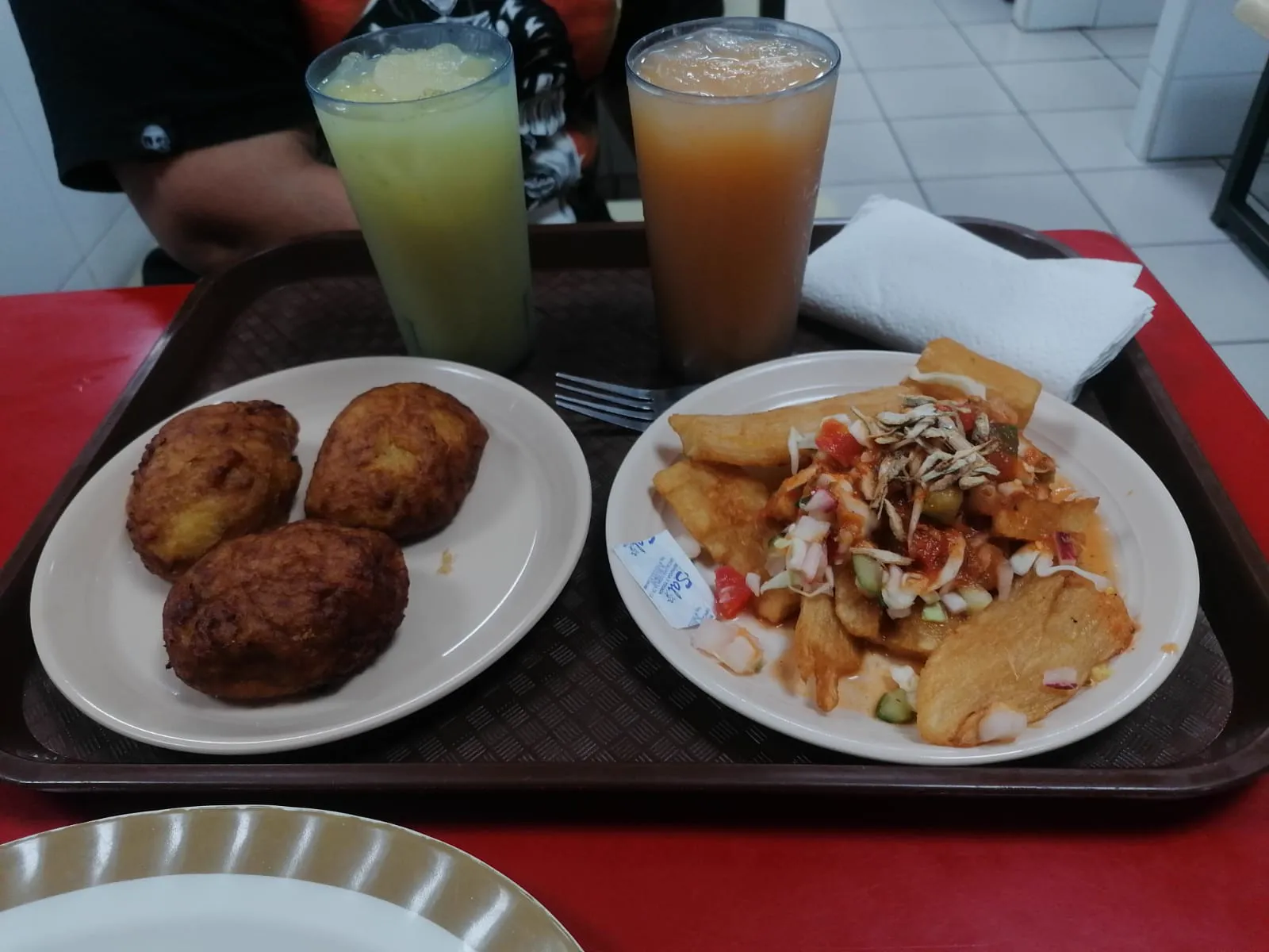 Empanadas and fried yuca with fresh juices